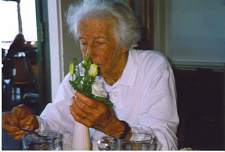 Mama Watering the Roses